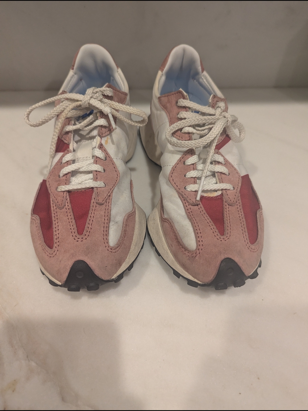 New Balance White Sneakers with Pink Accents and Blue Insole